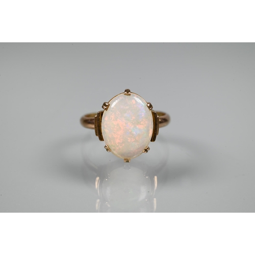 309 - An oval white opal set ring, 9ct rose gold, size L to/w an Art Deco style white opal set pendant nec... 