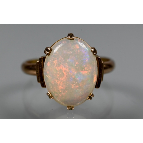 309 - An oval white opal set ring, 9ct rose gold, size L to/w an Art Deco style white opal set pendant nec... 