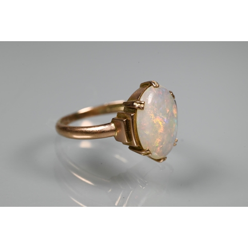 309 - An oval white opal set ring, 9ct rose gold, size L to/w an Art Deco style white opal set pendant nec... 