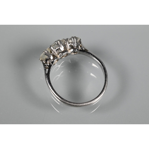 315 - A three-stone diamond ring, the three claw set diamonds set in 18ct white gold, diamond weight appro... 