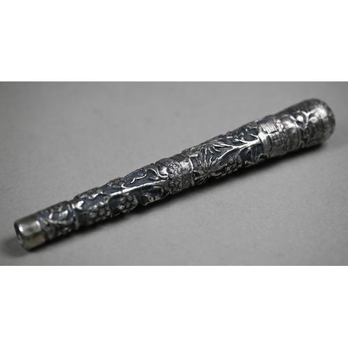 43 - A Burmese low-grade silver parasol handle, chased with jungle village and tiger chasing deer, 19cm