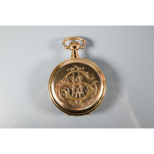 441 - A Swiss 18k open faced pocket watch, the crown wind movement with tarnished silvered dial with Arabi... 