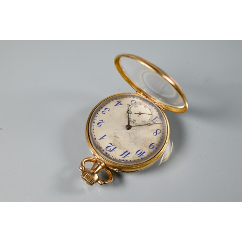 441 - A Swiss 18k open faced pocket watch, the crown wind movement with tarnished silvered dial with Arabi... 