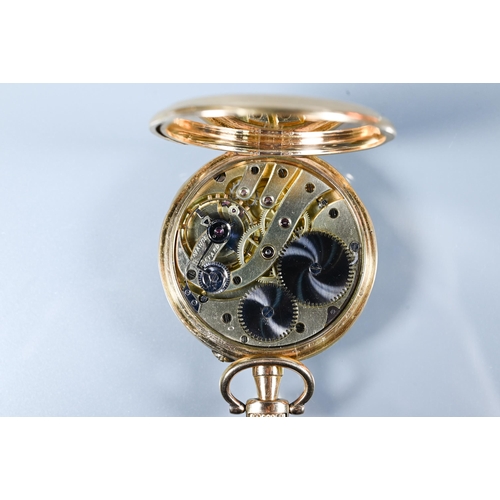 441 - A Swiss 18k open faced pocket watch, the crown wind movement with tarnished silvered dial with Arabi... 