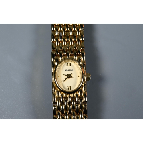 445 - A Teriam 9ct gold ladies wrist watch, on link bracelet, 12g all-in to/with a Sekonda gilt ladies bra... 