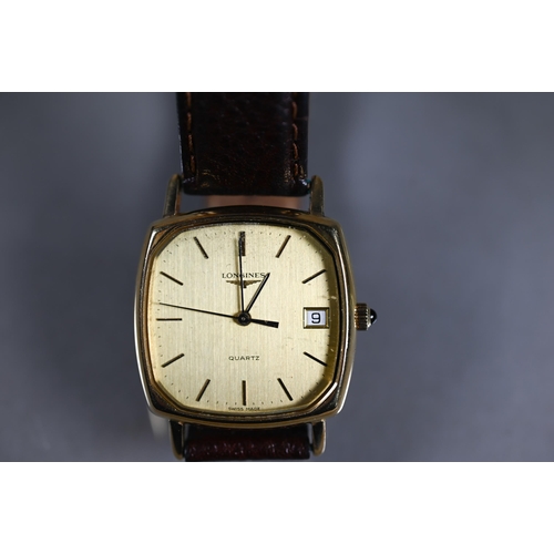 455 - A 14ct gents Longines calendar wristwatch, quartz movement, the case-back with presentation engravin... 