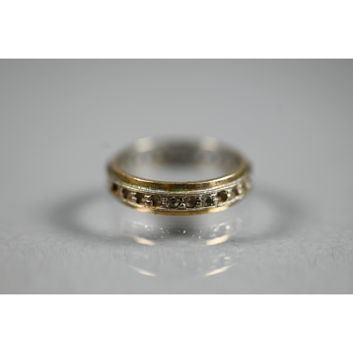 464 - A fragment of 9ct gold watch-strap, 3.4g, to/w a 9ct yellow and white gold eternity ring set with ge... 