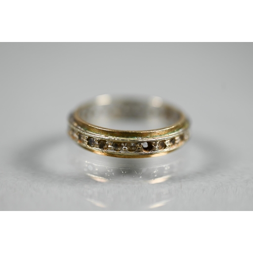 464 - A fragment of 9ct gold watch-strap, 3.4g, to/w a 9ct yellow and white gold eternity ring set with ge... 