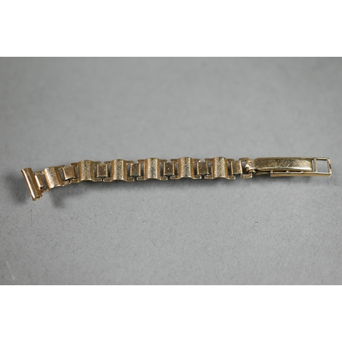 464 - A fragment of 9ct gold watch-strap, 3.4g, to/w a 9ct yellow and white gold eternity ring set with ge... 