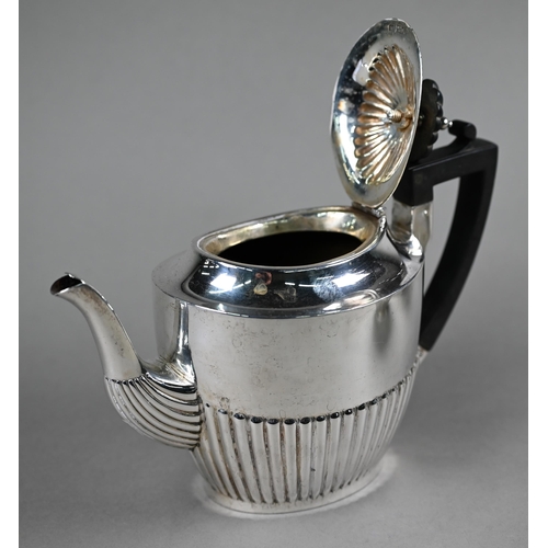 53 - A silver tea service of half-reeded oval form with composite handle and finial, Walker & Hall, S... 