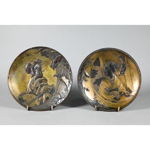 570 - Amendment - Two Japanese antimony metallic 'Geisha' dishes, 20th century, 15 cm diameter