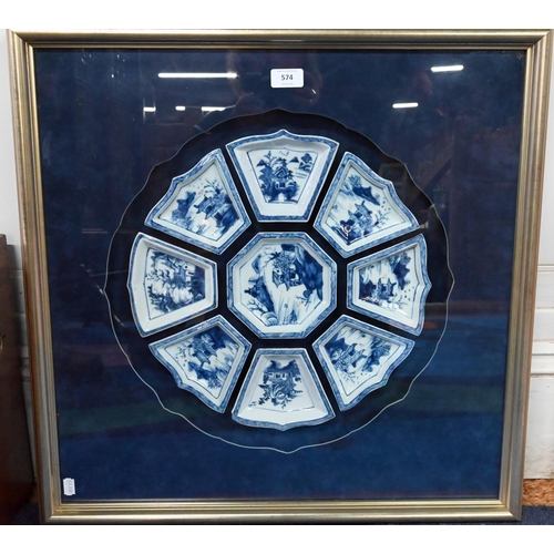 574 - A Chinese blue and white sweetmeat or rice table set comprising eight interlocking dishes surroundin... 