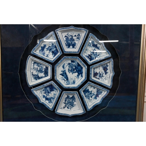 574 - A Chinese blue and white sweetmeat or rice table set comprising eight interlocking dishes surroundin... 