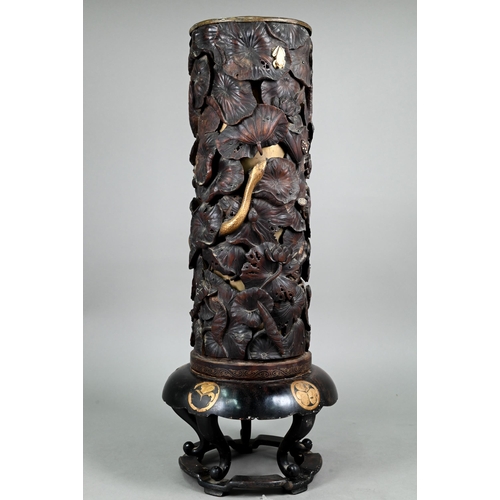 575 - A 19th century Japanese Shibayama hardwood stick stand with brass liner, profusely carved and reticu... 