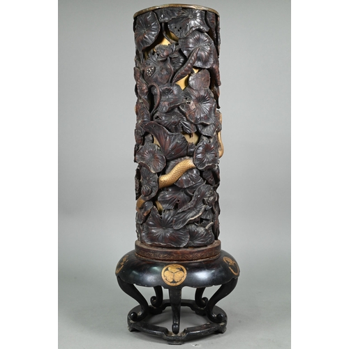 575 - A 19th century Japanese Shibayama hardwood stick stand with brass liner, profusely carved and reticu... 