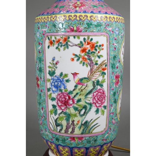 577 - A 20th century Chinese famille rose turquoise and pink ground rouleau vase (mounted as a lamp) on ha... 