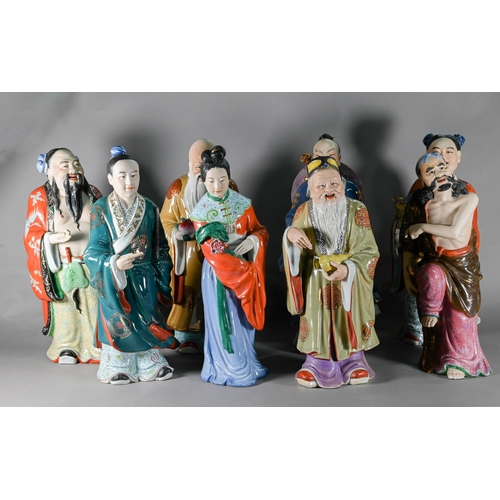 578 - A harlequin set of eight Chinese 20th century polychrome glazed figures, six of the eight Daoist Imm... 