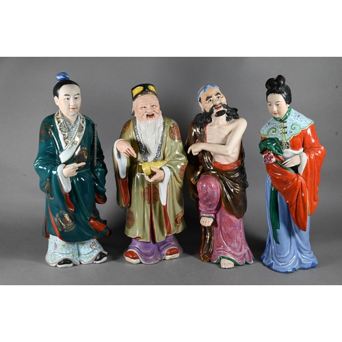 578 - A harlequin set of eight Chinese 20th century polychrome glazed figures, six of the eight Daoist Imm... 