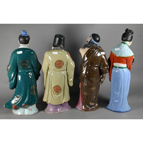 578 - A harlequin set of eight Chinese 20th century polychrome glazed figures, six of the eight Daoist Imm... 