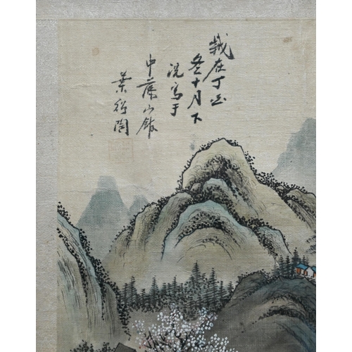 580 - A 20th century traditional Chinese landscape with figures walking along the riverbank, calligraphic ... 