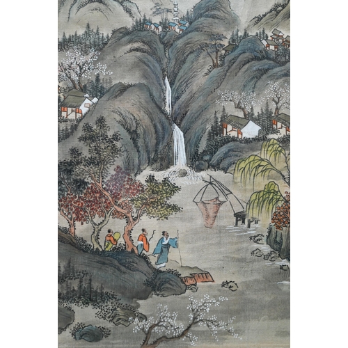 580 - A 20th century traditional Chinese landscape with figures walking along the riverbank, calligraphic ... 