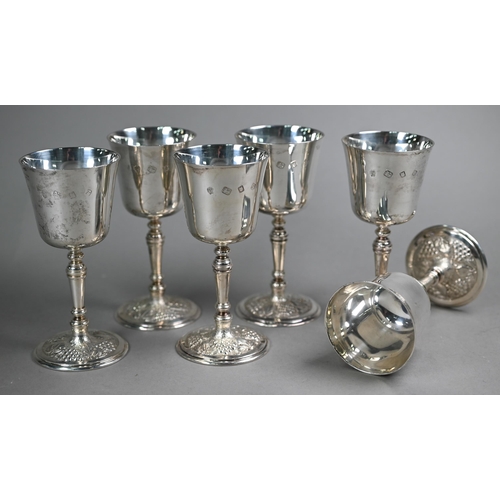 59 - A set of six heavy quality silver goblets on baluster stems with vine-chased bases, C.J. Vander Ltd,... 