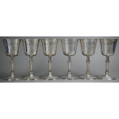 59 - A set of six heavy quality silver goblets on baluster stems with vine-chased bases, C.J. Vander Ltd,... 