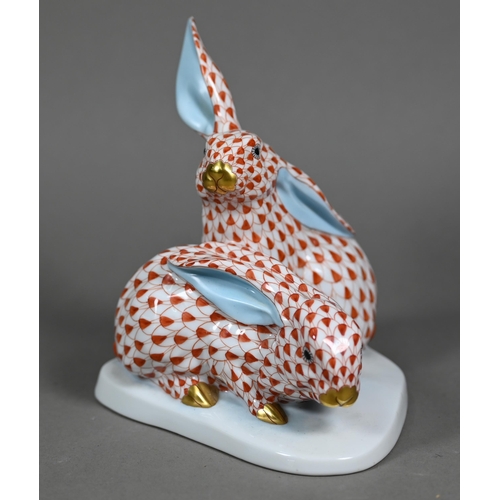 591 - A Herend red-scale group of two rabbits, 15 cm high to/w a smaller green-scale two rabbit group 8.5 ... 