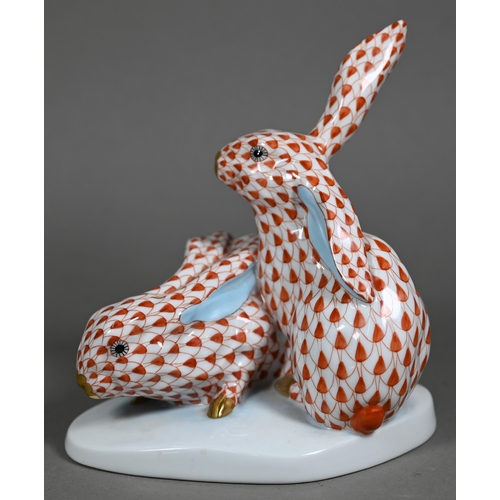 591 - A Herend red-scale group of two rabbits, 15 cm high to/w a smaller green-scale two rabbit group 8.5 ... 