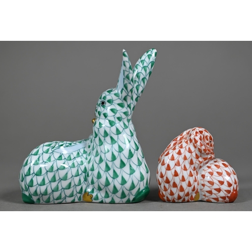 591 - A Herend red-scale group of two rabbits, 15 cm high to/w a smaller green-scale two rabbit group 8.5 ... 