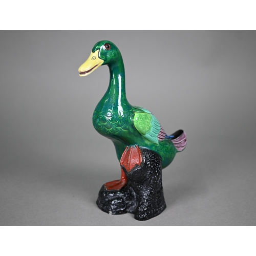 597 - An Edwardian Crown Staffordshire porcelain green-glazed duck, in the Chinese manner, 24 cm high