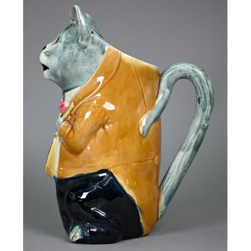 600 - A French majolica pottery novelty water-jug, modelled as a cat night-club singer with guitar, inscri... 