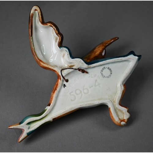 602 - A graduated set of four Beswick flying duck wall ornaments, 26-14 cm