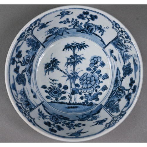 606 - An 18th century Delft blue and white plate, painted with lakeside pagoda, 23.5 cm to/w an 18th centu... 