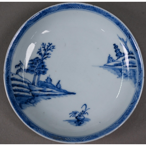 606 - An 18th century Delft blue and white plate, painted with lakeside pagoda, 23.5 cm to/w an 18th centu... 