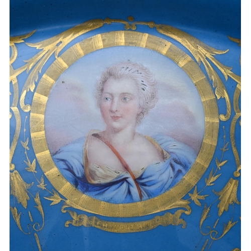 617 - A 19th century Sèvres porcelain large circular tray, painted with a portrait of Louis XV, encircled ... 