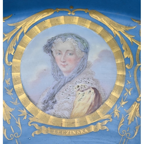 617 - A 19th century Sèvres porcelain large circular tray, painted with a portrait of Louis XV, encircled ... 