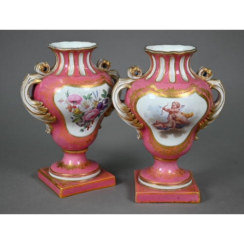 621 - A pair of 19th century Sèvres porcelain vases with twin foliate handles, on stemmed square bases, th... 