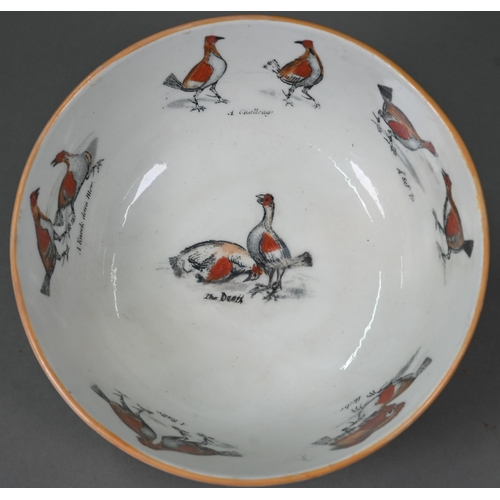 625 - A 19th century Staffordshire china punch bowl printed with cock-fighting scenes, 23 cm (restored)