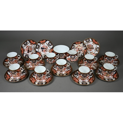 632 - A Royal Crown Derby Imari tea service comprising tea cups and saucers, twelve plates and a milk and ... 