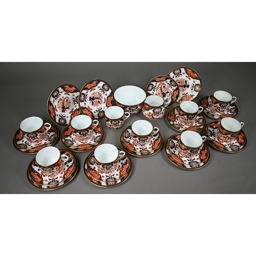 632 - A Royal Crown Derby Imari tea service comprising tea cups and saucers, twelve plates and a milk and ... 