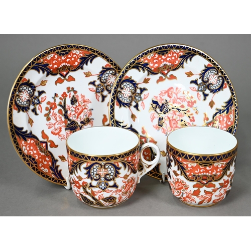 632 - A Royal Crown Derby Imari tea service comprising tea cups and saucers, twelve plates and a milk and ... 