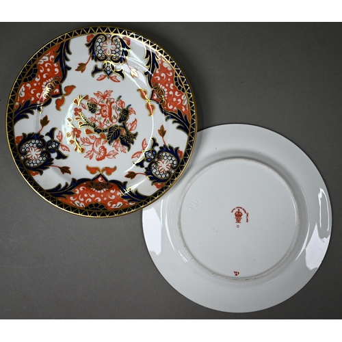 632 - A Royal Crown Derby Imari tea service comprising tea cups and saucers, twelve plates and a milk and ... 