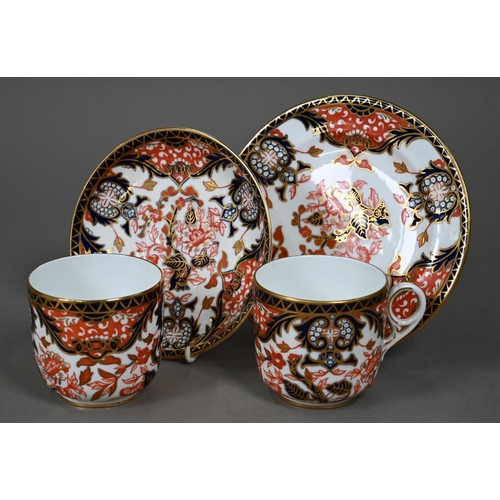 632 - A Royal Crown Derby Imari tea service comprising tea cups and saucers, twelve plates and a milk and ... 