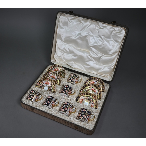 637 - A Royal Crown Derby Imari set of six coffee cans and saucers, 1910, in fitted presentation case