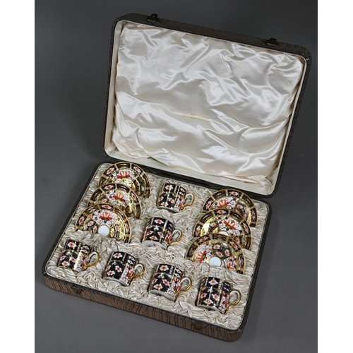 637 - A Royal Crown Derby Imari set of six coffee cans and saucers, 1910, in fitted presentation case