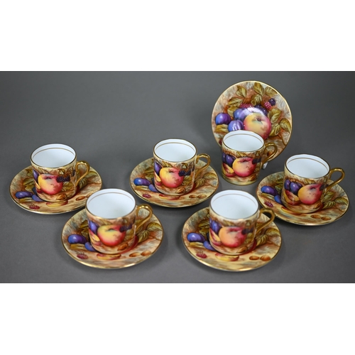 638 - A boxed set of six each Aynsley coffee cans and saucers, printed with fruit (one saucer chipped unde... 