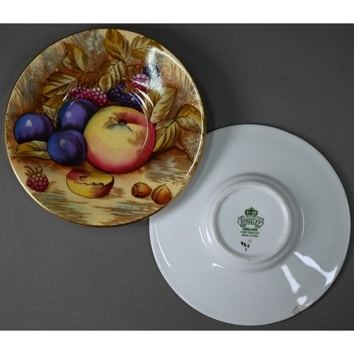 638 - A boxed set of six each Aynsley coffee cans and saucers, printed with fruit (one saucer chipped unde... 