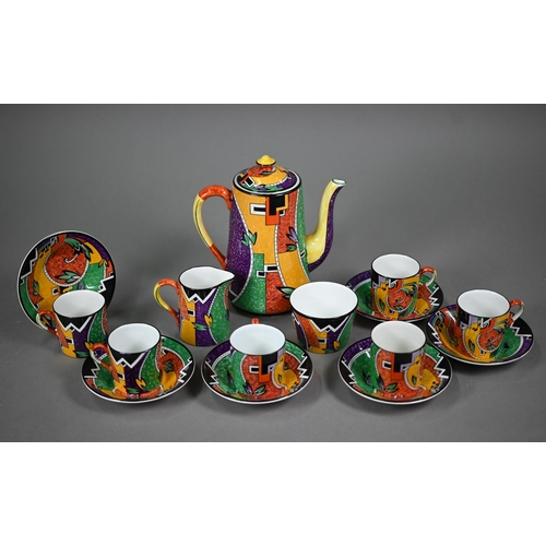 641 - An Art Deco pottery coffee service printed with polychrome abstract designs, comprising coffee pot, ... 