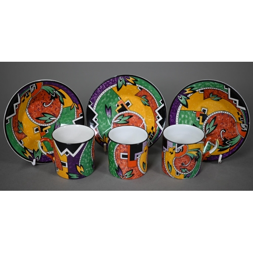 641 - An Art Deco pottery coffee service printed with polychrome abstract designs, comprising coffee pot, ... 